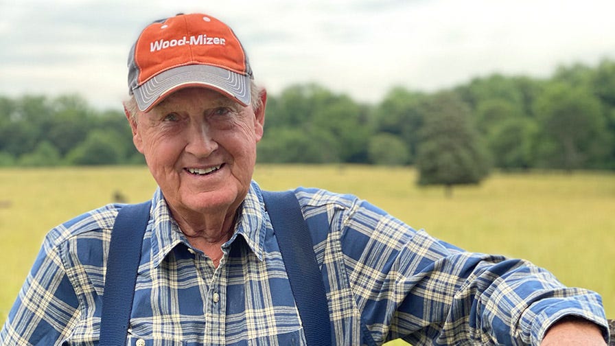 George Coker with Wood-Mizer sawmill hat