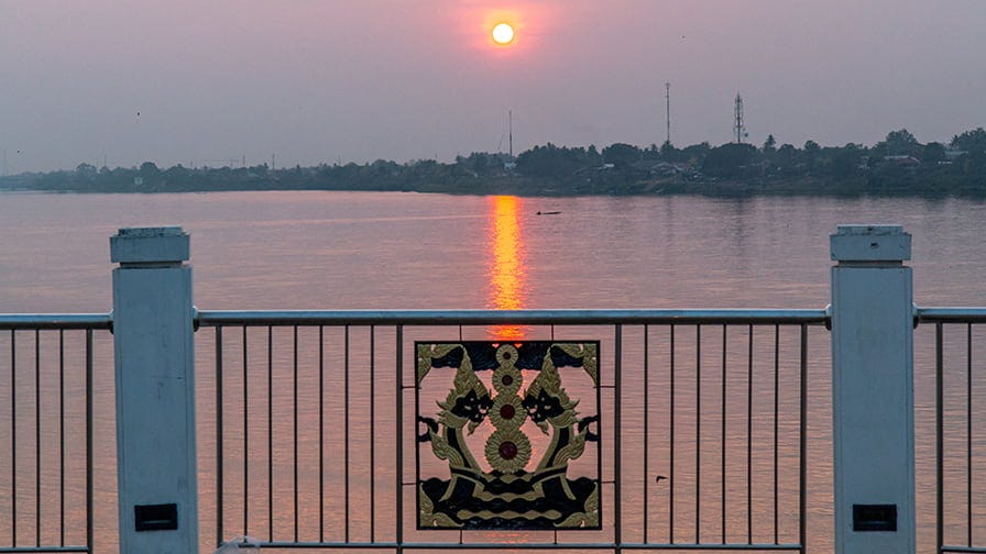 Beyond the Mekong river lies the timber-rich Laos.